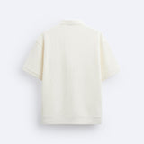 Korte Mouwen Polo in Crèmewit – Minimalistisch en Comfortabel