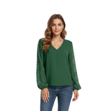 Damesblouse met V-hals en puffmouwen van textuurstof