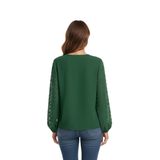 Damesblouse met V-hals en puffmouwen van textuurstof