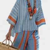 Valeria – gestructureerde terracotta top en linnen broeken