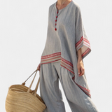 Rossella – asymmetrische blouse en etnische wijde broek