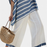 Ornella – verfijnde blauwe gestreepte top en broek met details aan de onderkant