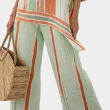 Elisabetta – elegante asymmetrische top en broek met wijde pijpen