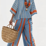 Valeria – gestructureerde terracotta top en linnen broeken