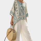 Annalisa – comfortabele bedrukte blouse en witte wijde broek